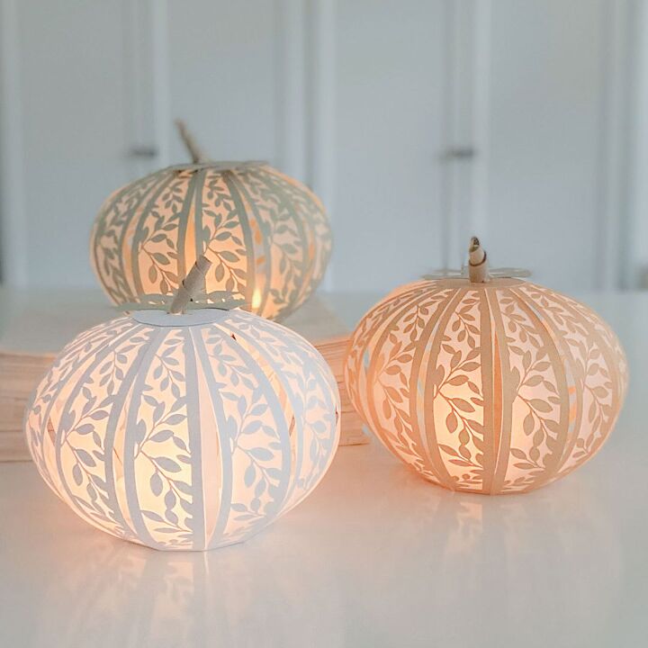 s 20 ways to sprinkle autumn colors throughout your home, Give your home a warm glow with paper pumpkin LED candle holders