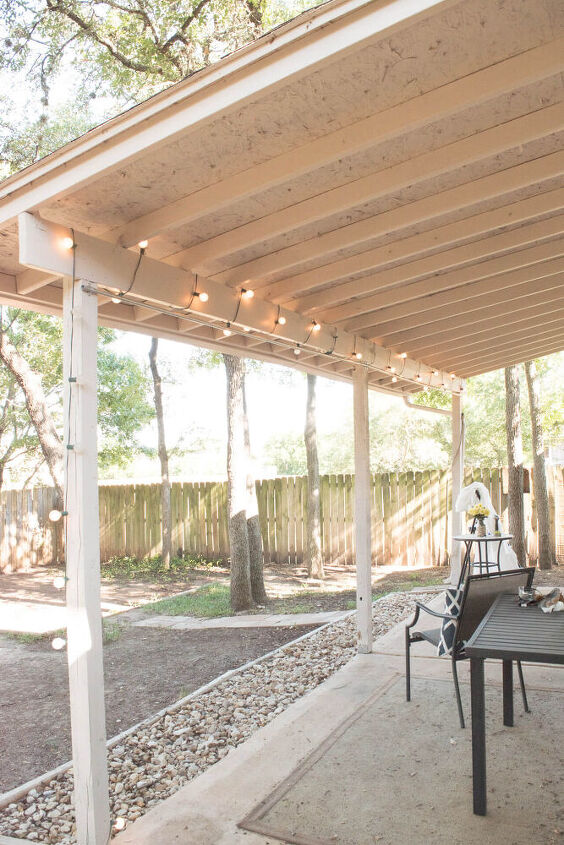 an inexpensive ikea patio makeover with outdoor curtains