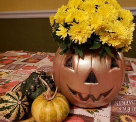 s 21 amazing pumpkin ideas you need to see before halloween, Plant flowers in a classic trick or treater pail