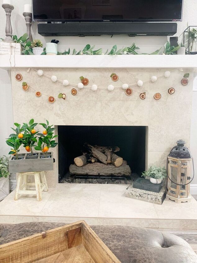s 16 magazine worthy fall mantel ideas, Spice up your home with this DIY autumn citrus garland