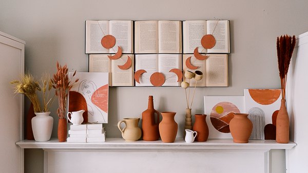 s 16 magazine worthy fall mantel ideas, Paint your vases to get a bohemian terracotta effect