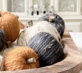 s 20 ways to turn thrifted items into charming fall decor, DIY these snuggly yarn pumpkins