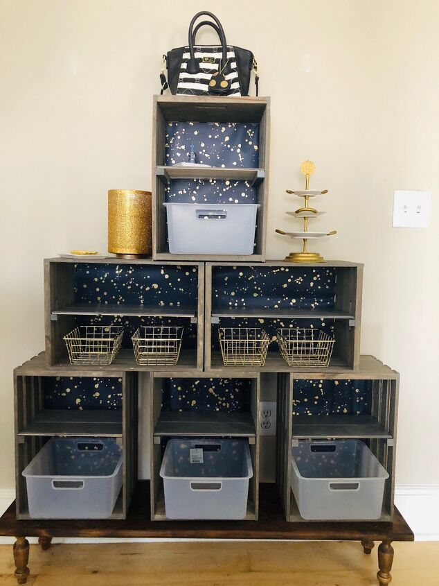 s 25 must try storage tricks that ll save your sanity, Maximize storage with a stacked pyramid crate organizer