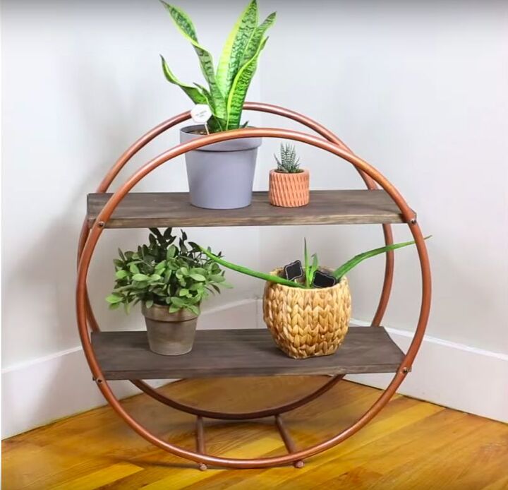 s 25 must try storage tricks that ll save your sanity, Build a stylish shelving unit with hula hoops