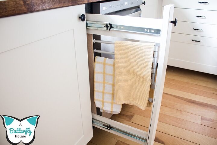 16 tricks that ll save you money on a full kitchen reno, Install a roll out towel rack