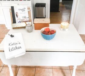 16 tricks that ll save you money on a full kitchen reno, Turn an antique table into an island