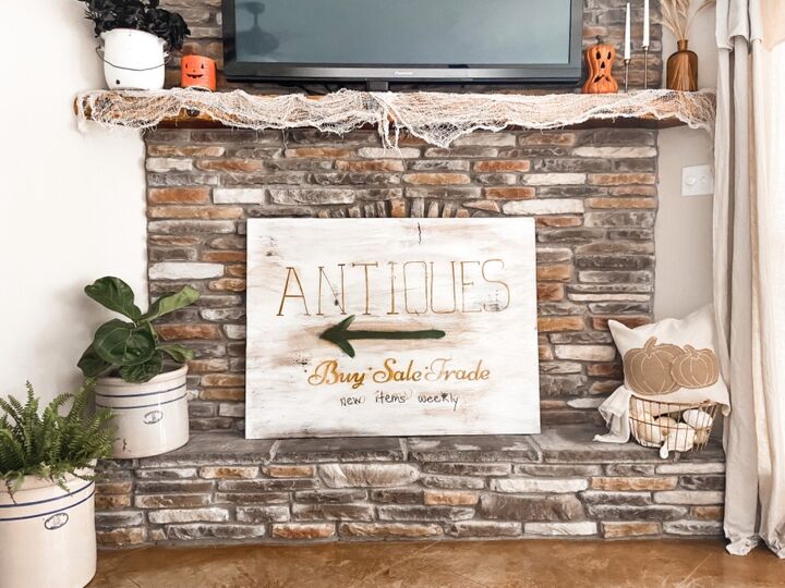 10 beautiful ways to make new things look vintage, Use a heat gun to make this wood burned antiques sign