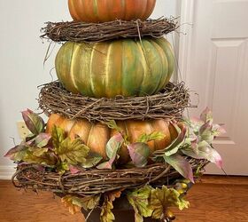 dressing up stacked pumpkins for fall