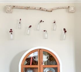 s 18 things you never thought to hang on your walls why you should, Install a whimsical birch wood and bottle wall piece
