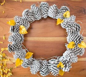 15 beautiful ways to use collected pine cones this season, Welcome fall with an eye catching pinecone wreath