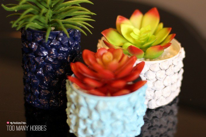 15 beautiful ways to use collected pine cones this season, Upcycle tin cans into mini pine cone encrusted planters