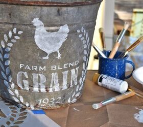 16 creative hacks to turn baskets and buckets into designer decor, Turn an old metal pail into a farm style stenciled gift bucket
