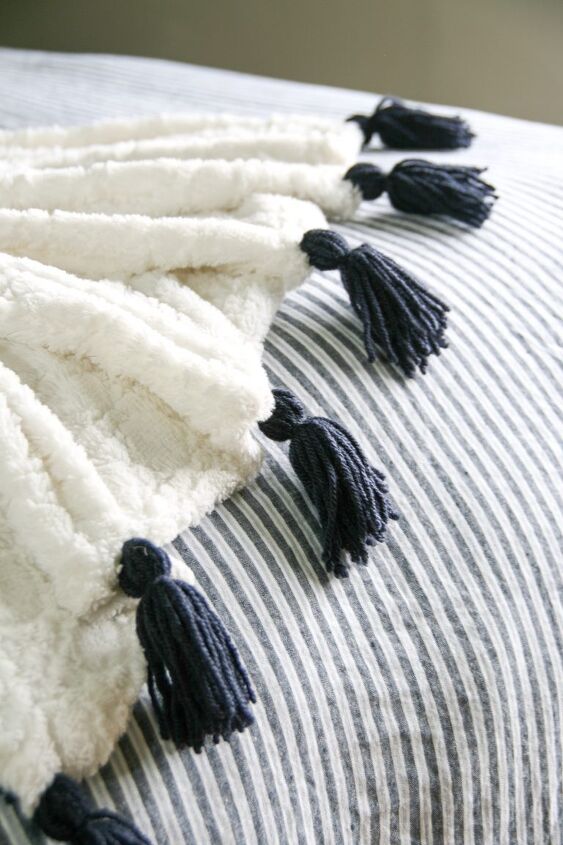 20 ways to warm up your home without touching the thermostat, Jazz up any throw blanket with DIY yarn tassels
