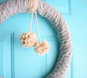 20 ways to warm up your home without touching the thermostat, Feel at home with a snuggly pompom sweater wreath