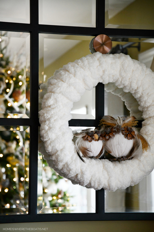 20 ways to warm up your home without touching the thermostat, Deck out your door with a fluffy finger knitted winter wreath