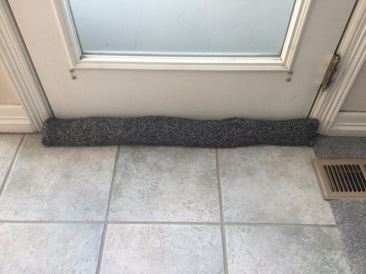 s 10 clever ways to insulate your home without hiring a pro, Upcycle an old sweater and a pair of socks into a door draft stopper