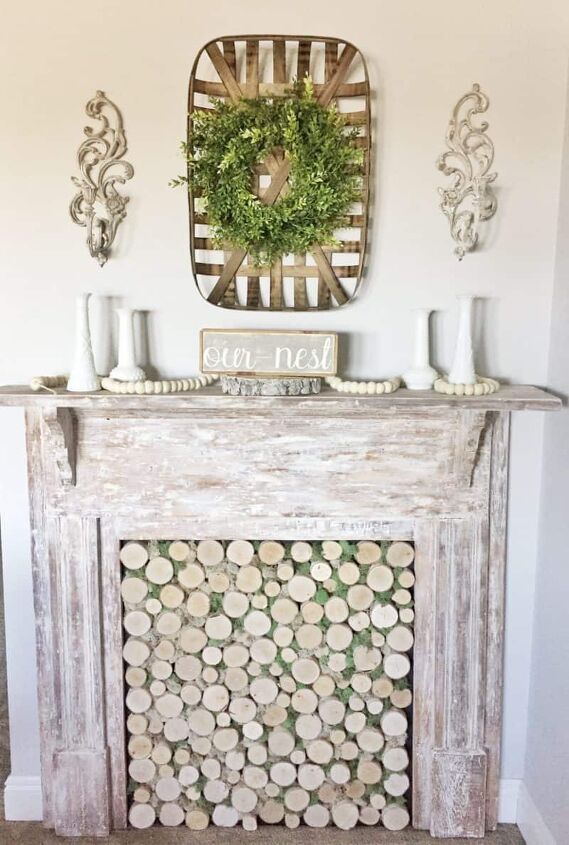 s 10 faux mantels that will make your winter home much cozier, Combine an antique mantel with a birch wood insert for a rustic faux fireplace