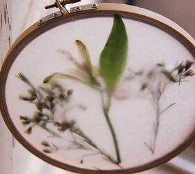 s 19 surprising ways to turn plain embroidery hoops into home decor, Bring nature in with a whimsical sun catcher
