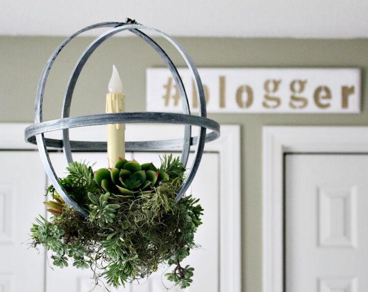 s 19 surprising ways to turn plain embroidery hoops into home decor, DIY this hanging faux metal succulent planter from embroidery hoops
