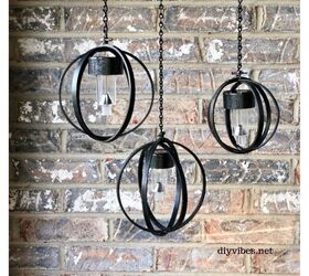 s 19 surprising ways to turn plain embroidery hoops into home decor, Create industrial ambience with hanging solar lights on your patio