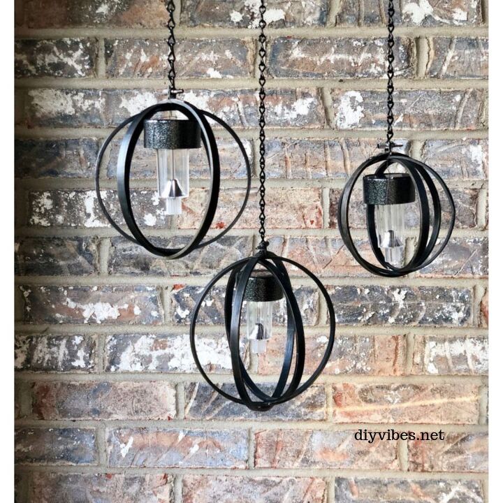 s 19 surprising ways to turn plain embroidery hoops into home decor, Create industrial ambience with hanging solar lights on your patio