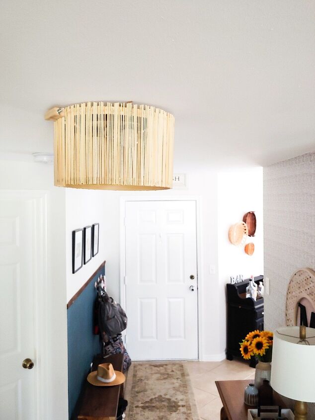 s 19 surprising ways to turn plain embroidery hoops into home decor, Make your own boho budget friendly light fixtures
