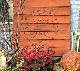 s replace your halloween porch decor with these 20 ideas, Send your neighbors a message with a rustic stenciled pallet