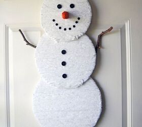 s replace your halloween porch decor with these 20 ideas, Build a fuzzy snowman from yarn and foam boards