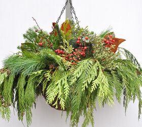 s replace your halloween porch decor with these 20 ideas, Add color to your porch with a lush winter hanging basket