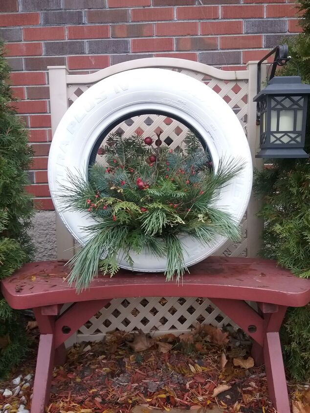 s replace your halloween porch decor with these 20 ideas, Upcycle an old tire into a winter planter