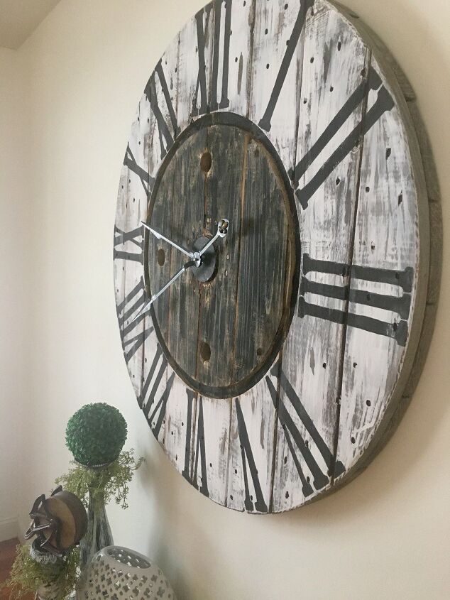 s 12 reasons why we re on the hunt for cable spools this week, Make a rustic clock from the top of a wire spool