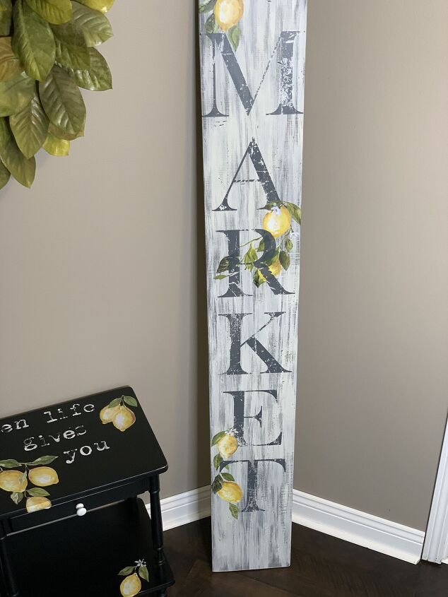 s 13 gorgeous home upgrades using decals from the weathered shed, Leaning Market Sign