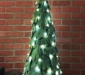 s try these 18 unique christmas tree ideas from items you already have, Lit Spare Mitten Tree