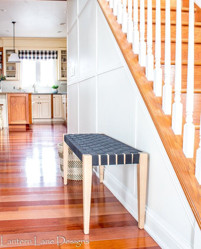 20 of our favorite board and batten wall transformations, Spice up the angled wall under your stairs with board and batten