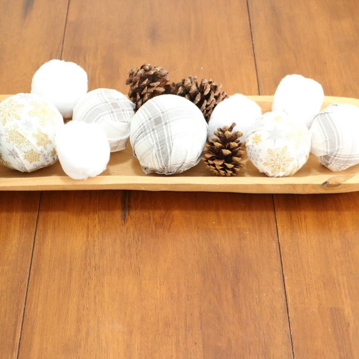 s 25 budget ways to make your home feel cozier this winter, DIY these scarf covered spheres for your winter dough bowl centerpiece