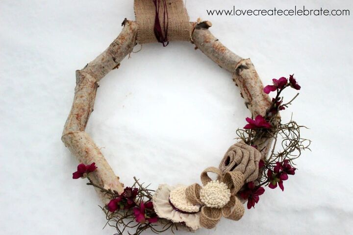 15 winter wreaths we re so ready to hang on our doors, Go rustic with a gorgeous birch wood wreath