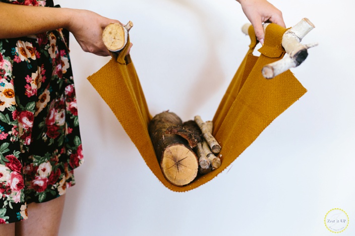 10 ridiculously cute ways to store your fire wood this season, Bring your firewood indoors with this rustic carrier