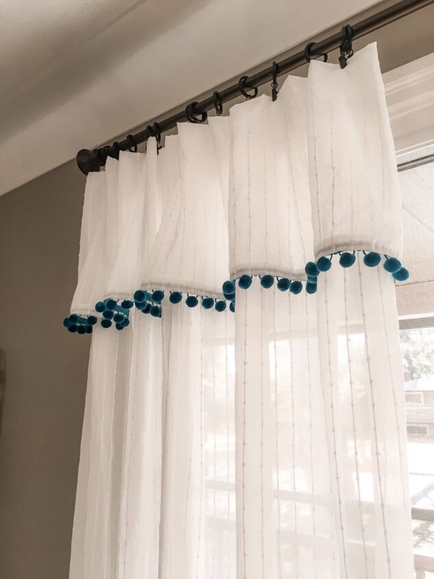 s 15 creative ways to upgrade your old window curtains, Add a fold over ruffle and playful pompom trim to boring curtains