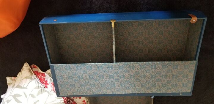 q reupholstering inside a steamer trunk