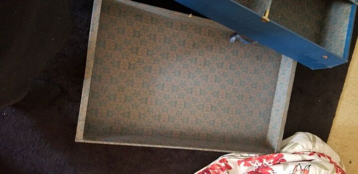 q reupholstering inside a steamer trunk