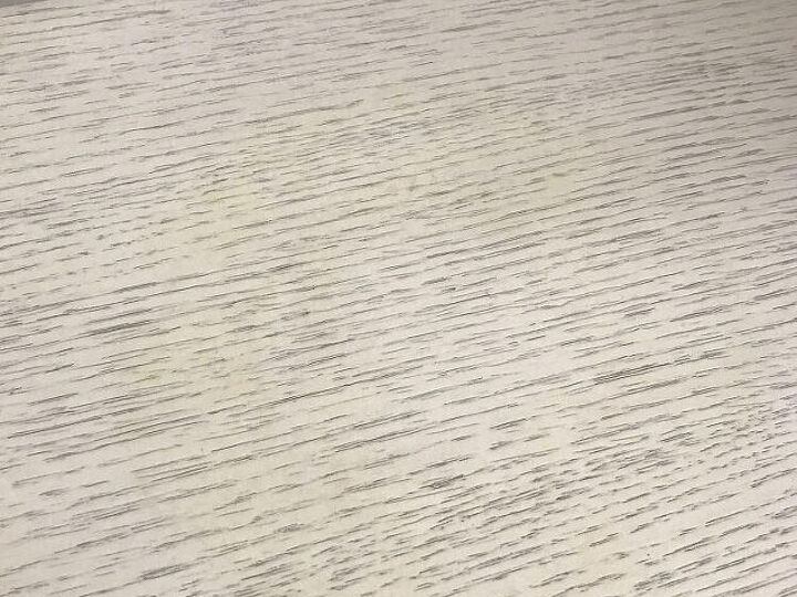 q how to remove yellow moisture stain from white furniture
