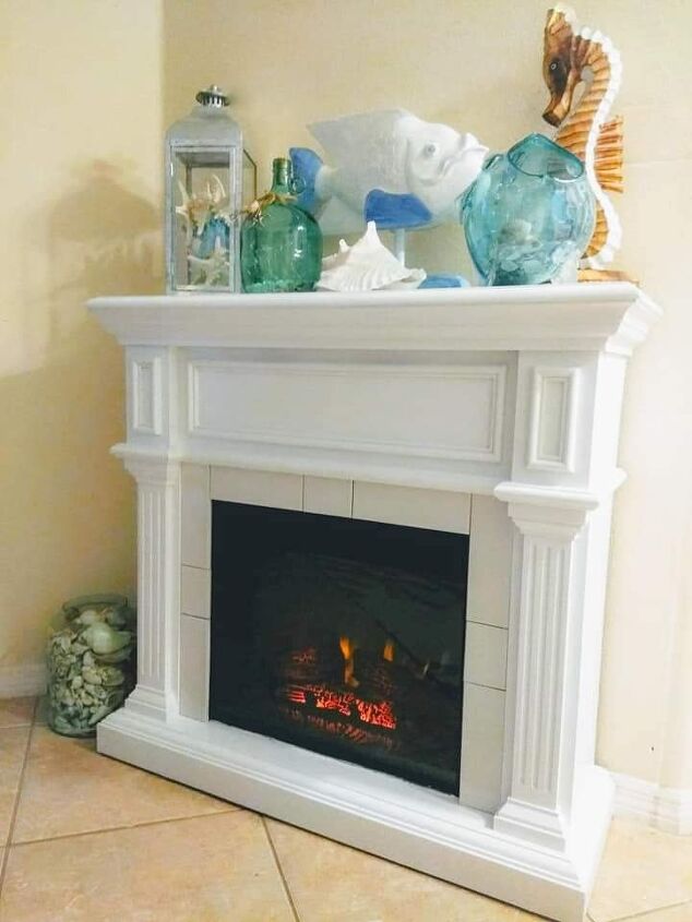 s 20 fireplace makeovers that will get your home in shape for the cold, Brighten your home with a sleek white fireplace