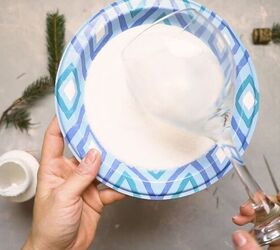 Flip over a wine glass and cover it in salt for this charming table accent