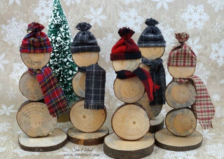 s 20 insanely cute snowmen that ll make it feel like winter, Make rustic mini snowpeople from wood slices