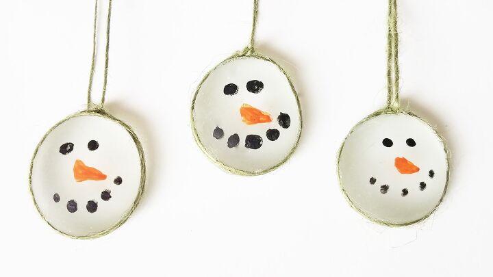 s 20 insanely cute snowmen that ll make it feel like winter, Make adorable snowman ornaments from flat marbles