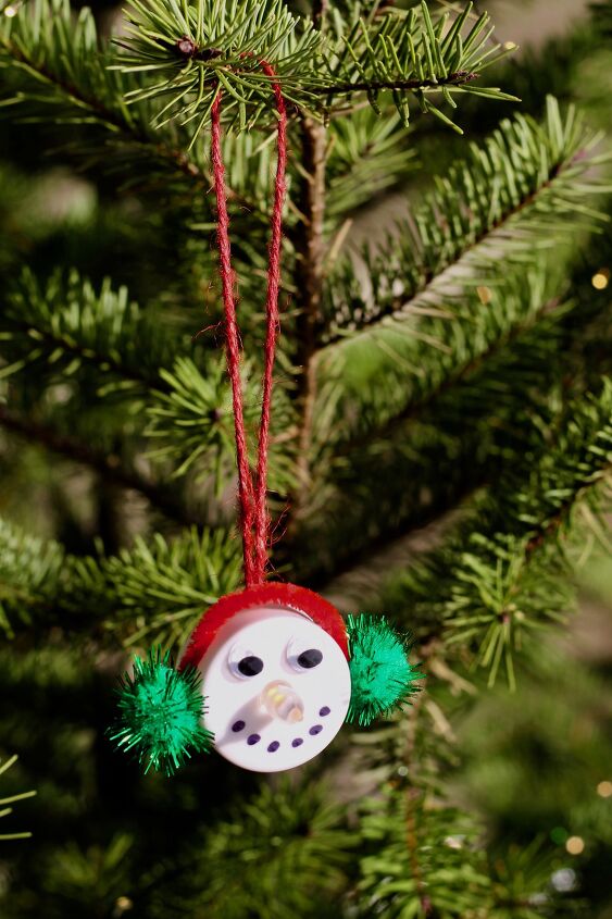 s 20 insanely cute snowmen that ll make it feel like winter, Brighten up your tree with silly snowman tealight ornaments