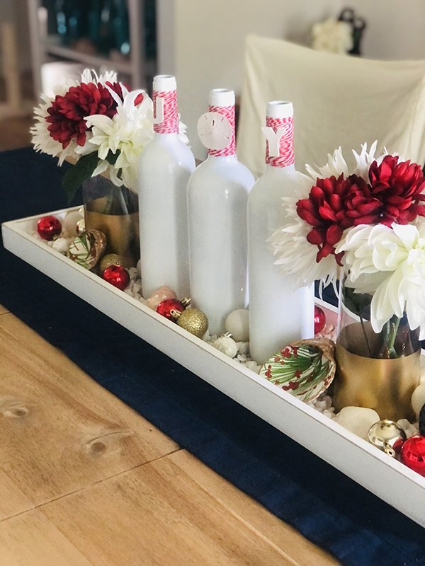s 16 of our all time favorite christmas upcycles, Turn an empty wine bottle into classy Christmas decor