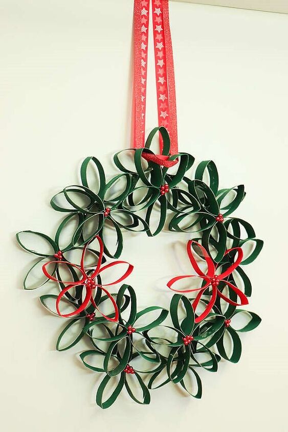s 16 of our all time favorite christmas upcycles, Transform toilet paper rolls into a festive floral door wreath