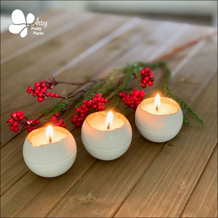 s 20 candles you should make this season, DIY these round cement candles from mini plastic ball molds