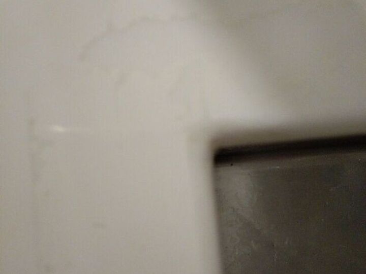 q how to repair peeling paint on white corian countertop